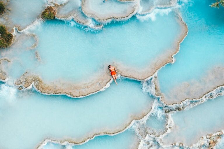 therme bad staffelstein - Relaxing woman in Saturnia's stunning turquoise hot springs, Tuscany.